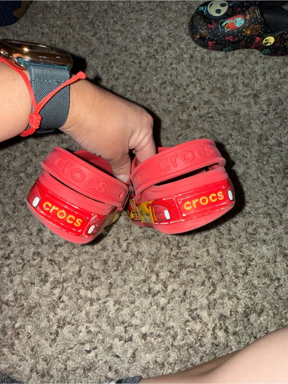 CROCS Red Kids Slip-On Clogs with Playful Eye Graphic